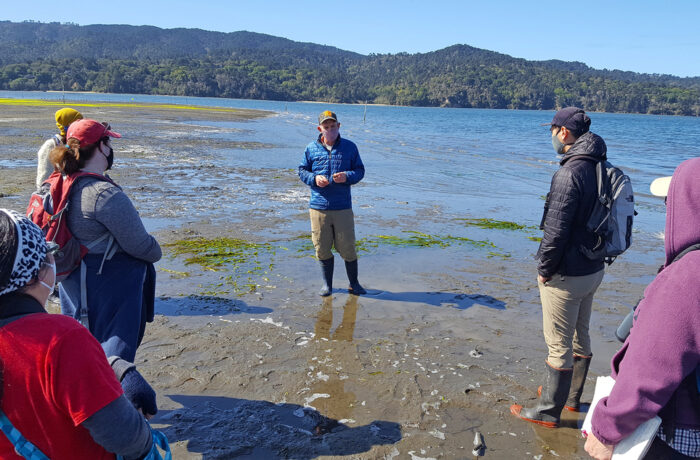 UCANR Climate Stewards Program participants standing on shoreline