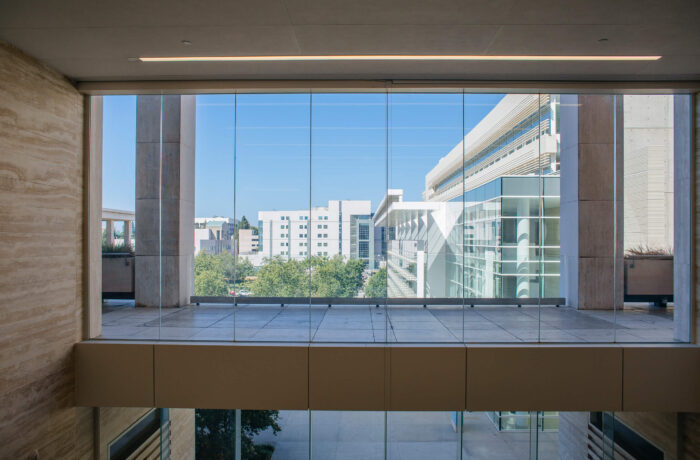 Hallway in UCLA Health Building with a view of the campus