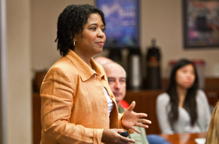 Female staff member addressing the room