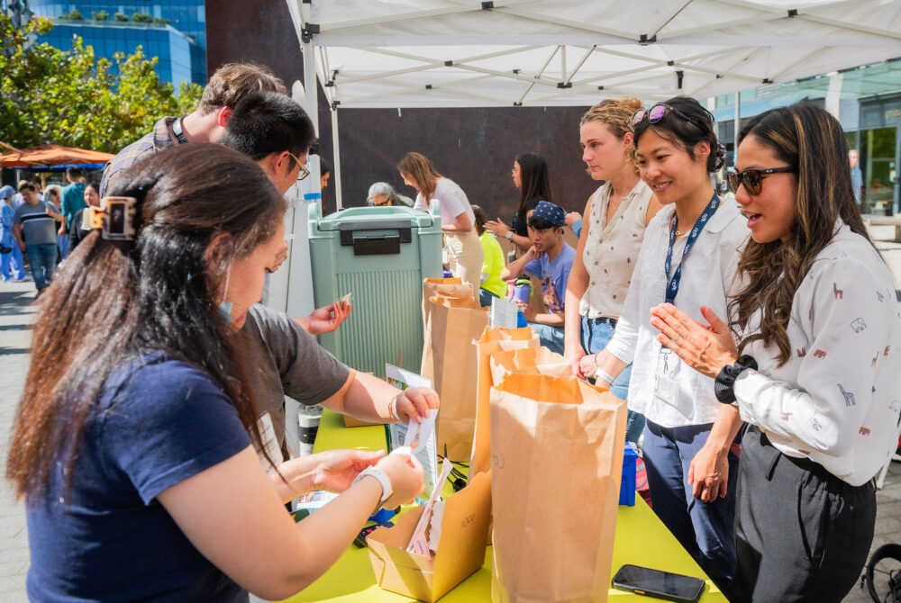 Student Receiving Paper Bags