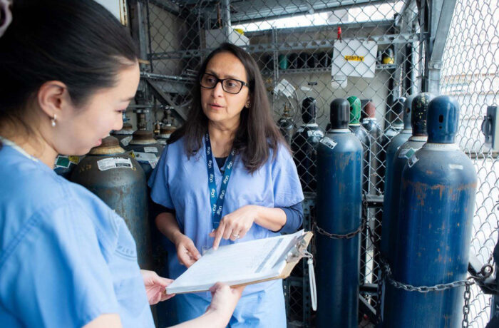 Nurses Using Checklist Next To Nitrous Oxide