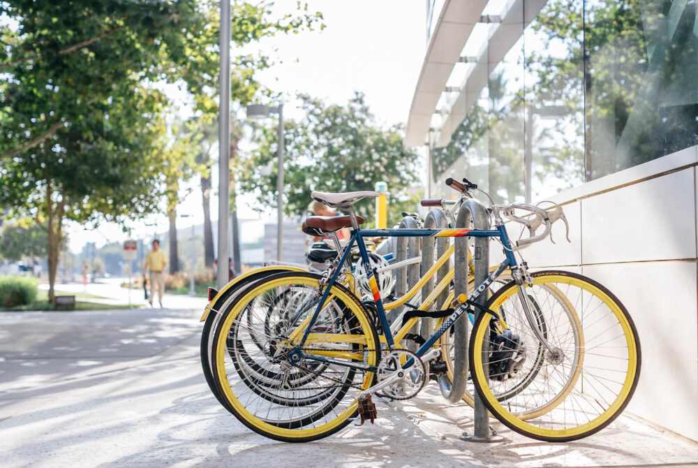 Bikes lined up on bike rack