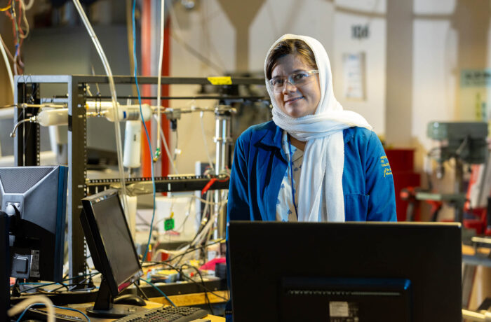 A researcher in in the Atmospheric Processes Lab