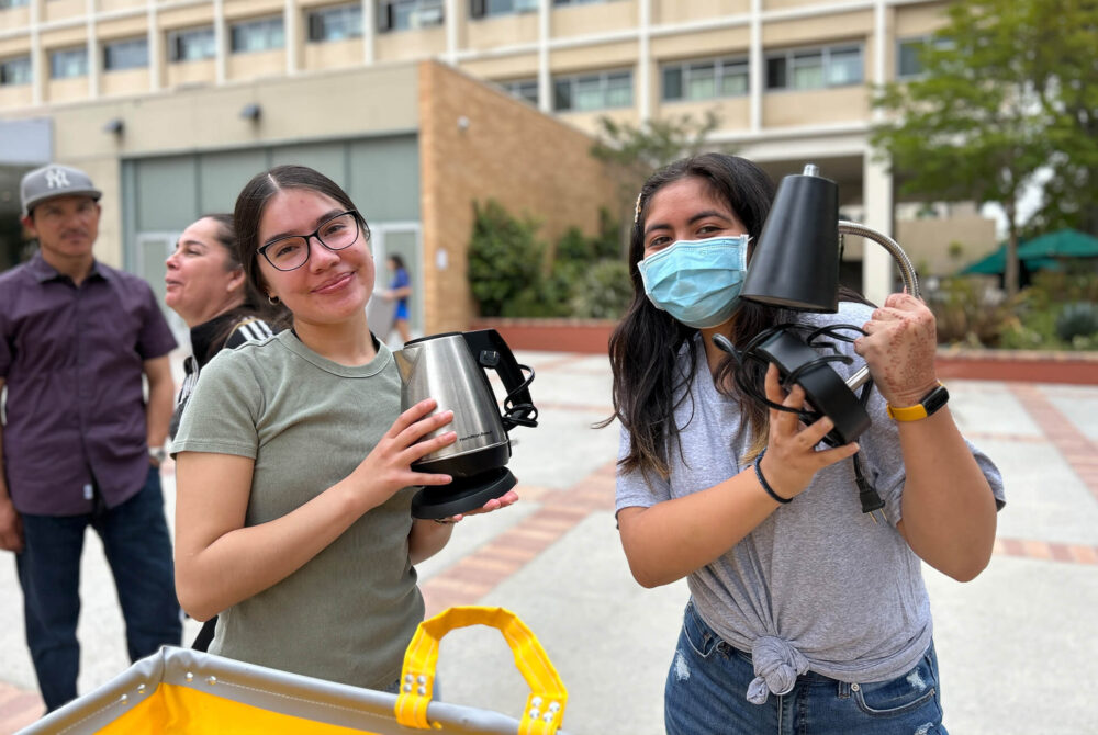 Students collecting items as they move out
