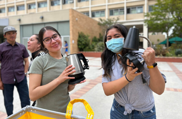 Students collecting items as they move out